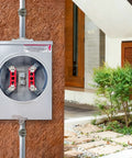 Heavy Duty 125 Amp Meter Socket 4 Jaw Base 600V One Phase Three Wire Ringless Gear With Horn Bypass Cover Plate Electric Meter Box mounted on exterior wall.