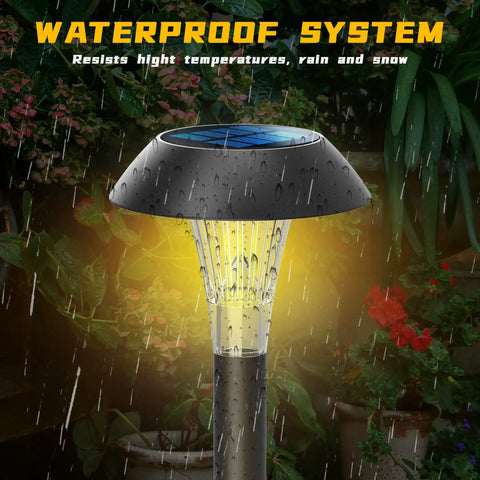 Solar Pathway Lights 12 Pack Outdoor Waterproof Landscape Lighting showing waterproof feature with glowing light under rainfall.