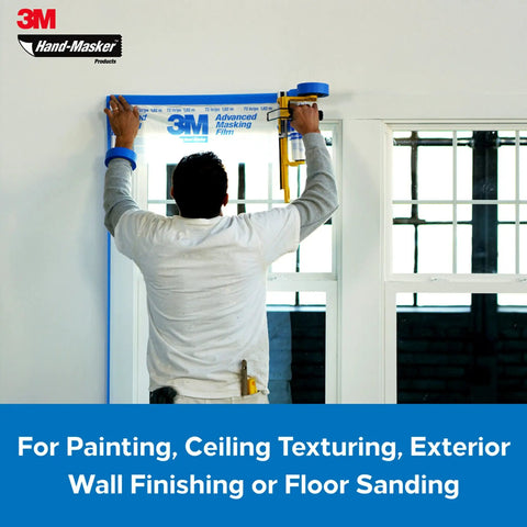 Person using Pro Grade Masking Film For Indoor And Outdoor Use 72 Inch By 90 Foot Roll With Static Cling Keeps Film In Place