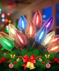 Colorful Christmas light bulbs arranged in a festive display with decorations