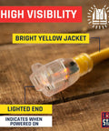 Close-up of 10 Gauge Heavy Duty Lighted Plug Outdoor Extension Cord 25 Ft Yellow Weatherproof Contractor Grade, lighted end.