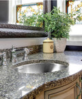 Opus Built To Last Stainless Steel Undermount Bathroom Sink 18 Inch Oval Bowl With Overflow Drain Assembly in granite counter