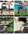 Rolling Pizza Oven Stand With Beveled Stainless Steel Top 31 By 19 Inches Foldable Extension Table Outdoor Bar Cart for kitchens, poolsides, gardens, and courtyards.