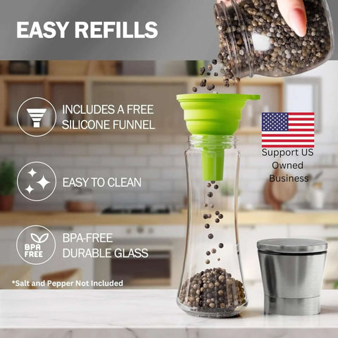 Stainless Steel Salt And Pepper Grinder Set Of 2 With Adjustable Ceramic Mills, filled with peppercorns using a green funnel.