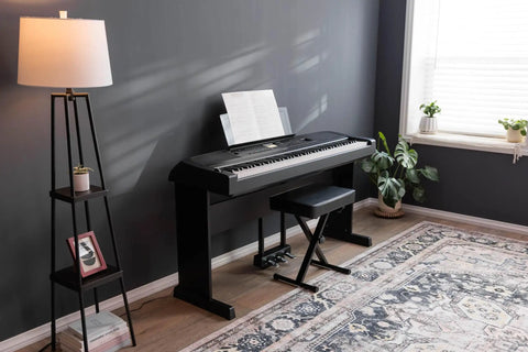 DGX-670B 88 Key Weighted Digital Piano With CFX Grand Piano Sound And Acoustic Touch Action in home setting, black finish
