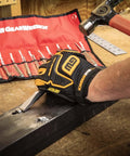 Using the 12 Piece Punch And Chisel Chrome Set For Pros And DIYers, cutting rivets on metal, red tool roll in background