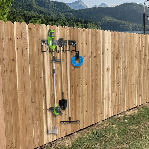 Heavy Duty Metal Garage Tool Organizer Wall Mount Kit Four Pack With Extension Cord Straps Garden Shed Hooks installed on fence