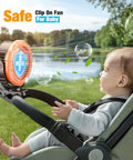 Portable Misting Clip On Fan With 100ml Water Tank LED Light 360 Degree Rotating Spray attached to stroller with baby