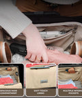 Briggs & Riley Baseline 2-wheel cabin bag in black, open interior with clothes and multiple pockets.