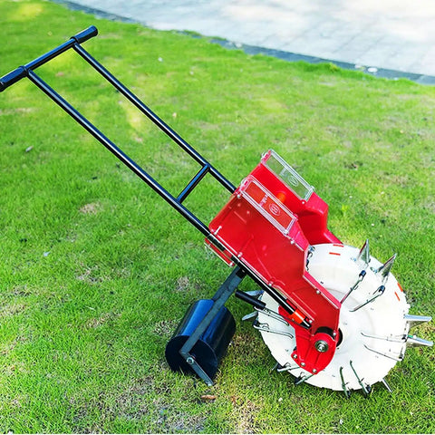 Garden Seeder Spreader For Home Use, Handheld Seeding Machine And Fertilizer Applicator With Dual Seed And Fertilizer Buckets on grass