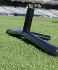 Close-up of Beefy Steel Frame Baseball L Net Protective Screen frame on grass, showcasing quick connect joints for easy assembly.