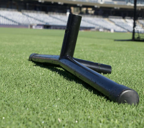 Close-up of Beefy Steel Frame Baseball L Net Protective Screen frame on grass, showcasing quick connect joints for easy assembly.