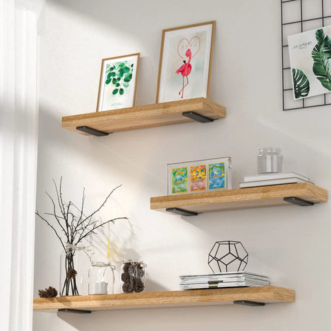 Wall display using Six Pack 6 Inch Floating Shelf Brackets Built Tough Heavy Duty Hidden L Brackets For DIY Rustic Industrial Shelves.
