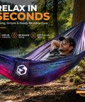 Man relaxing in an Ultralight Two-Person Camping Hammock For Backpacking And Festivals, Easy Setup with tree-friendly ropes.