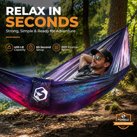Man relaxing in an Ultralight Two-Person Camping Hammock For Backpacking And Festivals, Easy Setup with tree-friendly ropes.