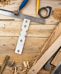 Beefed Up Heavy Duty Joining Plates for Wooden Door Frames with tools, enhancing stability and preventing warping.