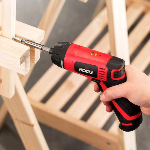 Person using Cordless Electric Screwdriver Kit With Built In LED Light And 31 Pc Bit Set, Rechargeable Battery on wooden structure