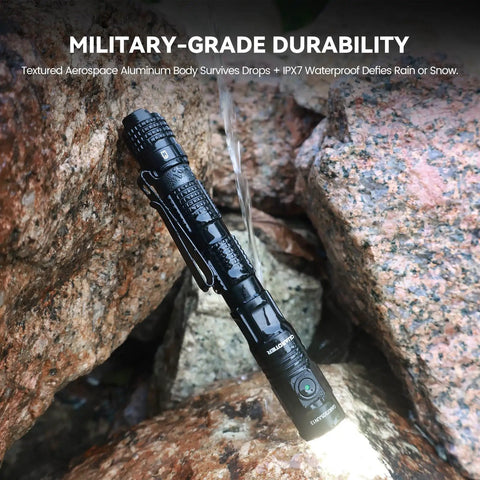 Rechargeable Flashlight 1500 Lumens USB-C Tail Switch 5 Modes Aluminum Tactical Penlight for Outdoor Work, Camping, and Emergencies, Compact 6.1 Inch EDC Torch Black resting on wet rocks showing durability.
