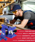 Heavy Duty Four And A Half Inch Tough As Nails Bench Vise With Multi Jaw Design For Woodworking And Metalworking Clamps Flat Or Round Materials On A Workbench Or Table Clamp For Welding Drilling Milling And More shown with worker in workshop.