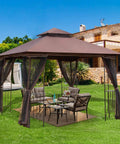 Heavy Duty Outdoor 10x10 Gazebo With Double Roofs, Metal Corner Frame Shelves, And Mosquito Netting on a grassy backyard