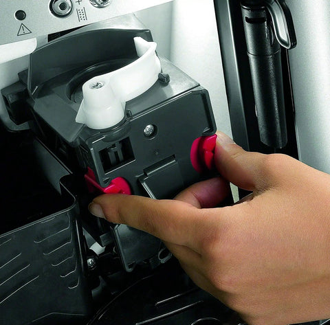Hand adjusting the controls on the Premium Super Automatic Espresso And Coffee Maker With Integrated Burr Grinder Bean To Cup Brewing Silver Model.