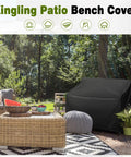 All Weather Outdoor Loveseat Cover For Patio Benches And Gliders Waterproof 420D Oxford Fabric Tough As Nails Built To Last Black covering patio loveseat in garden setting.
