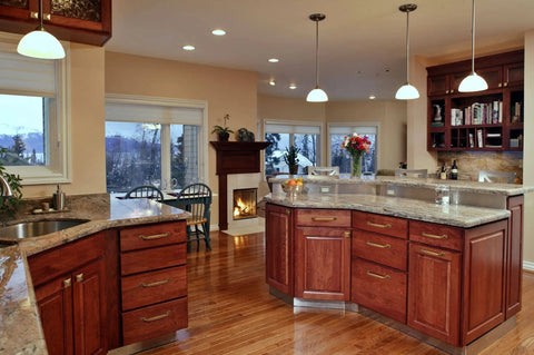 Modern kitchen with Six Pack Antique Brass Arch Cabinet Pulls, 5-Inch Center-To-Center Zinc Alloy Drawer Handles adorning cupboards.