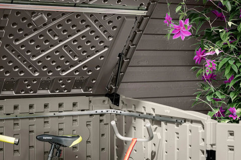 Open Horizontal Outdoor Storage Shed For Trash Cans And Yard Tools All Weather Resin With Soft Close Lid, showing interior space.