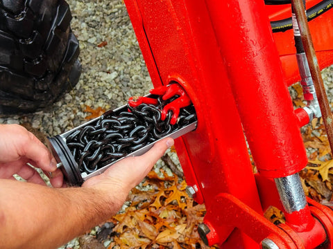 Inserting Space Saving Hidden Torque Tube Tool Tray Organizer into loader tube, heavy duty storage for chains.