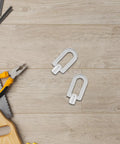 Three Piece Aluminum Dent Puller Ring Kit For Auto Body And Sheet Metal Repair, Pro Grade Aluminum Pull Rings on wood surface