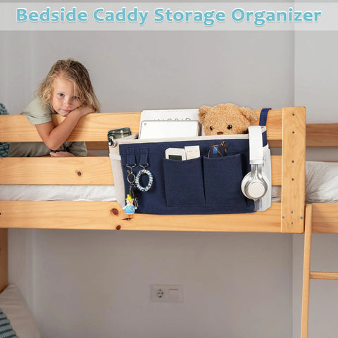 Bedside Caddy Hanging Organizer For Beds And Rails, navy blue canvas with multiple pockets, attached to a bunk bed.