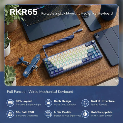 Absolute Beast 60 Percent Mechanical Gaming Keyboard With Gasket Mount And Rgb Backlighting Volume Knob Pbt Keycaps Mda Profile Qmk Via Hot Swappable Layout For Late Night Grinding And Vibing Blue Edition on a wooden desk with a laptop.