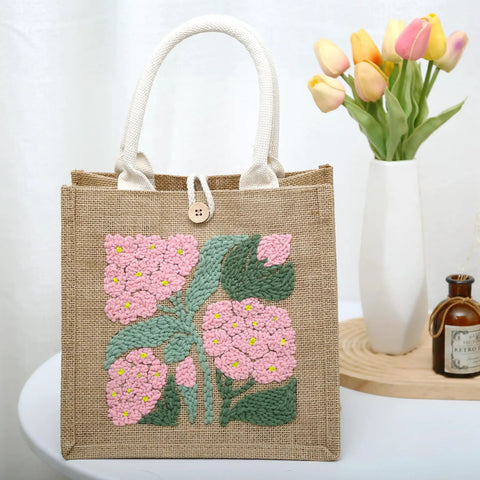 DIY Punch Needle Tote Bag Kit For Adults And Beginners With Video Tutorial And Clear Written Instructions Includes Tools For A Unique Pink Green Tote Pattern You Can Craft On The Go showing finished floral design on bag.
