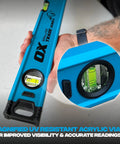 Person holding Pro Grade 2 Foot Aluminum Level Box Beam with magnified vials for precise 0.0005 in/in accuracy use on concrete.