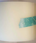 4 Inch By Point Zero One Five Inch By 100 Foot Urethane Die Protection Film roll, for press brake, on a plain background