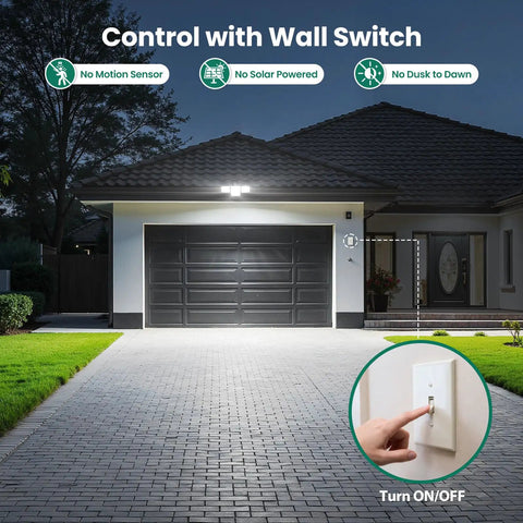 70W 7000LM LED Flood Light With 4 Adjustable Heads illuminating garage exterior at night, wall switch highlighted