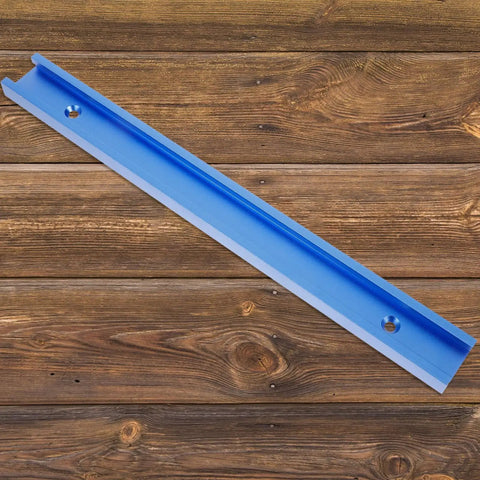 Blue multifunctional aluminum T track slot guide for woodworking on a wooden background, used with table saw and panel saw accessories