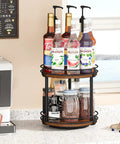 Rotating Spice Rack Two Tier Lazy Susan Organizer For Kitchen Countertop with bottles and jars on wooden turntable on counter
