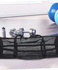 Mesh Basketball Duffle Bag Large Capacity Gym Tote For Sports Gear Dive And Snorkeling Equipment Soccer Ball Carrier Heavy Duty PVC Mesh Tote For Outdoor Workout And Travel on gym floor with fitness equipment.
