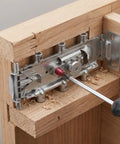 Installation of No Drill Cabinet Bracket Set Concealed Steel Shelf Brackets in wood, showing screwdriver and bracket detail.