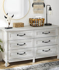 Rustic dresser with black iron handles in vintage farmhouse style, featuring the Rustic Gate Handle Set 2 Pack Iron Hardware Pull with Screws.