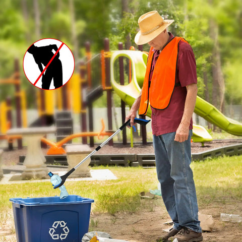 Person using 6 Pack 32 Inch Heavy Duty Trash Grabber Reacher With Ergonomic Handle And Non Slip Grip for outdoor cleanup in a park
