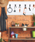 36 Piece Slatwall Hooks And Hangers Set With Heavy Duty Slat Wall Hooks And 4 Storage Straps in use on garage wall