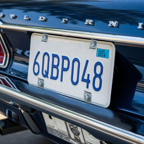 Four Piece Badass U Nut Fastener Clips For Car License Plates And Bumpers Built Tough For Any Ride Quick Install Rust Resistant Steel Hardware Lock It Down Tight on a license plate.
