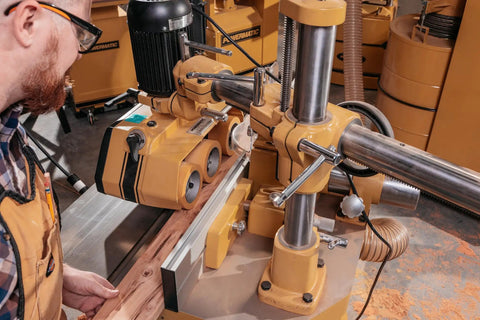 Heavy Duty Rock Solid 3 Roll Power Feeder With 1 HP Motor And 460 Volt 3 Phase System For Effortless Material Feed showing setup with wood utilization.