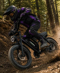 Rider navigating forest trail on U12 Electric Fat Tire Bike For Adults With 1500W Peak Motor 48V 20Ah Removable Battery Full Suspension