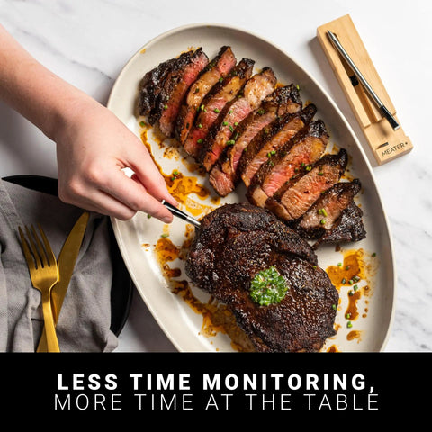 Person using Wireless Meat Thermometer Pro For Grilling And Cooking With Bluetooth App 100 Percent Wire Free Temperature Monitoring