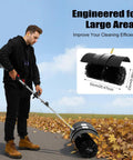 Zero Sweat Cleanup With This Gutsy 52cc Two Stroke Gas Powered Walk Behind Lawn Sweeper in use on a leaf-strewn pathway.