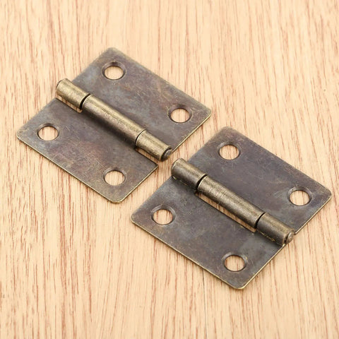 Antique Bronze Decorative Hinges For Wood Boxes And Cabinets, 38x34mm Butt Hinge Set, Vintage Drawer And Door Hardware, Two Pack on wood surface