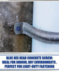 Close-up of Heavy Duty Blue Hex Head Concrete Screw Anchors PTFE Coated Carbon Steel 1/4 In X 2-3/4 In mounted onto a surface.